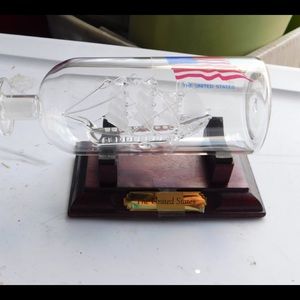 USA flag on Ship in a bottle on stand